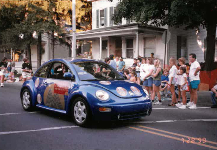 Bank's Volkswagen Beetle in parade in 1999